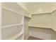 Large walk-in closet with ample shelving and hanging space at 6990 E Buckhorn Trl, Scottsdale, AZ 85266