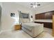 Spacious bedroom with a plush bed and built-in cabinets at 6990 E Buckhorn Trl, Scottsdale, AZ 85266