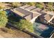Large home with pool and basketball court, aerial view at 6990 E Buckhorn Trl, Scottsdale, AZ 85266