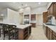 Spacious kitchen with island, stainless steel appliances, and wooden cabinetry at 6990 E Buckhorn Trl, Scottsdale, AZ 85266