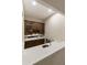 Home wet bar with wine storage and sink at 6990 E Buckhorn Trl, Scottsdale, AZ 85266