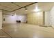 Large garage with storage cabinets and overhead door at 6990 E Buckhorn Trl, Scottsdale, AZ 85266