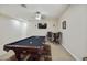 Fun game room with a pool table and bar seating at 6990 E Buckhorn Trl, Scottsdale, AZ 85266