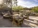 Outdoor patio with fire pit and comfortable seating at 12297 E Troon Vista Dr # 255, Scottsdale, AZ 85255