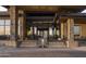 Modern community entrance with stone accents and a water feature at 12297 E Troon Vista Dr # 255, Scottsdale, AZ 85255