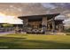 Landscaped lawn with patio, seating and mountain views at 12297 E Troon Vista Dr # 255, Scottsdale, AZ 85255