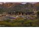 Aerial view of community building and surrounding desert landscape at 12297 E Troon Vista Dr # 255, Scottsdale, AZ 85255