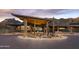 Attractive community entrance with desert plants and mountain views at 12297 E Troon Vista Dr # 255, Scottsdale, AZ 85255