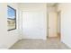 Spacious bedroom with large closet and neutral carpeting at 630 N Star Ct, Apache Junction, AZ 85119