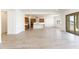 Open concept living area with kitchen and sliding glass doors at 630 N Star Ct, Apache Junction, AZ 85119