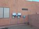 Exterior view of solar panel inverters at 25645 W Blue Sky Dr, Wittmann, AZ 85361
