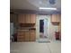 Garage with workbench and interior access at 25645 W Blue Sky Dr, Wittmann, AZ 85361
