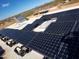 Rooftop solar panel array for clean energy and potential savings at 25645 W Blue Sky Dr, Wittmann, AZ 85361