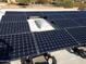 Residential rooftop covered with solar panels at 25645 W Blue Sky Dr, Wittmann, AZ 85361