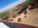 Aerial view of backyard with desert landscaping at 25645 W Blue Sky Dr, Wittmann, AZ 85361