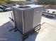 Rooftop view of an air conditioning unit and solar panels at 25645 W Blue Sky Dr, Wittmann, AZ 85361