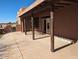 Large covered patio with access to the house at 25645 W Blue Sky Dr, Wittmann, AZ 85361