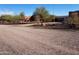 Gravel driveway leading to the property at 25645 W Blue Sky Dr, Wittmann, AZ 85361