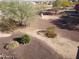View of the side yard with gravel and desert landscaping at 25645 W Blue Sky Dr, Wittmann, AZ 85361