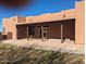 Large covered patio with access to the house at 25645 W Blue Sky Dr, Wittmann, AZ 85361
