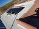 Rooftop solar panel array installed on the house at 25645 W Blue Sky Dr, Wittmann, AZ 85361