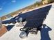 Solar panels installed on the home's roof at 25645 W Blue Sky Dr, Wittmann, AZ 85361
