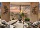 Peaceful patio with fire pit and sunset views at 28448 N 95Th Pl, Scottsdale, AZ 85262