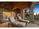 Built-in grill and outdoor kitchen with seating for lounging at 10040 E Happy Valley Rd # 676, Scottsdale, AZ 85255