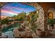 Inviting pool and spa with a stone patio and mountain views at 10040 E Happy Valley Rd # 676, Scottsdale, AZ 85255