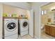 Laundry room with washer, dryer, and shelving at 2101 S Meridian Rd # 441, Apache Junction, AZ 85120