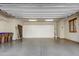 Spacious garage with ample storage and epoxy floor at 3105 S Amble Pass, Gold Canyon, AZ 85118
