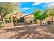 Beautiful home exterior with a brick driveway and courtyard entry at 3105 S Amble Pass, Gold Canyon, AZ 85118