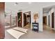 Long hallway with access to bedrooms and other areas of the home at 3105 S Amble Pass, Gold Canyon, AZ 85118