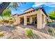 Covered patio with built-in BBQ and fire pit, perfect for outdoor entertaining at 3105 S Amble Pass, Gold Canyon, AZ 85118