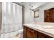 Clean bathroom with shower/tub combo and wood vanity at 3105 S Amble Pass, Gold Canyon, AZ 85118