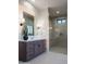 Spa-like bathroom with walk-in shower and a large vanity at 34749 N 83Rd Way, Scottsdale, AZ 85266