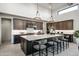 Gourmet kitchen boasting a large island, modern cabinetry, and high ceilings at 34749 N 83Rd Way, Scottsdale, AZ 85266