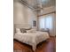 Spacious bedroom with hardwood floors and a ceiling fan at 865 E Monte Vista Trl, Wickenburg, AZ 85390