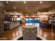Open living area with hardwood floors, high ceilings, and stunning views at 865 E Monte Vista Trl, Wickenburg, AZ 85390
