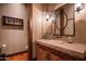Rustic-chic bathroom with unique sink and vanity at 865 E Monte Vista Trl, Wickenburg, AZ 85390