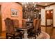 Bright dining room with chandelier and custom built-in cabinetry at 865 E Monte Vista Trl, Wickenburg, AZ 85390