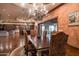 Formal dining room with a chandelier, hardwood floors, and seating for six at 865 E Monte Vista Trl, Wickenburg, AZ 85390