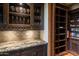 Well-organized pantry with ample shelving and granite countertop at 865 E Monte Vista Trl, Wickenburg, AZ 85390