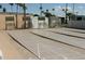 Well-maintained shuffleboard courts for community recreation at 8421 E Main St # 106, Mesa, AZ 85207