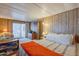 Spacious bedroom with a bed and access to a balcony at 8421 E Main St # 106, Mesa, AZ 85207