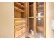 Large walk-in closet with ample shelving and drawers at 11108 E Mariola Way, Scottsdale, AZ 85262