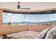 Bedroom with large window offering mountain views at 11108 E Mariola Way, Scottsdale, AZ 85262