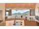 Modern kitchen with granite countertops and ample cabinetry at 11108 E Mariola Way, Scottsdale, AZ 85262
