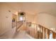 Spacious upstairs hallway with a beautiful view of the downstairs at 1873 E Mcnair Dr, Tempe, AZ 85283