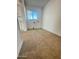 Laundry room with tile flooring and window at 1736 W Indianola Ave, Phoenix, AZ 85015